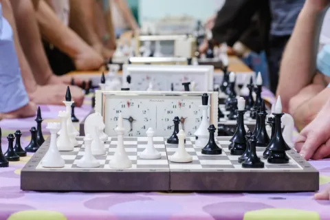 chess boards with clock beside board