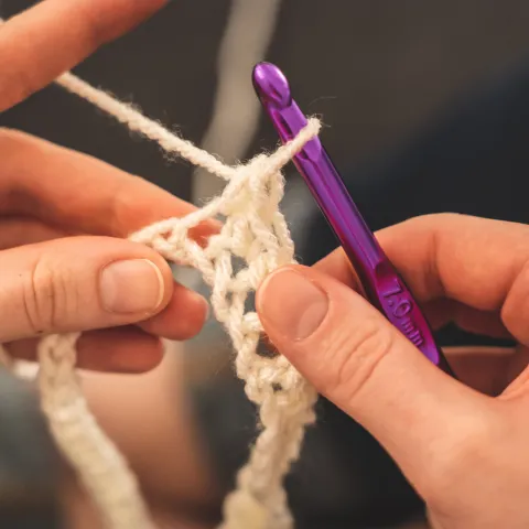 closeup of someone doing crochet