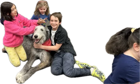 kids petting a dog