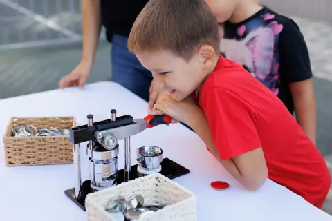 kid with button press