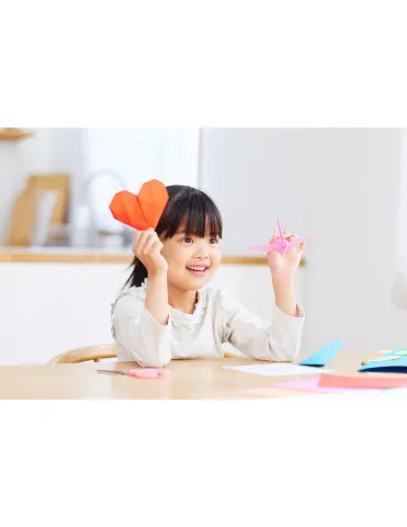 Girl Holding Origami