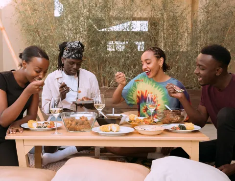 Teens eating at a table