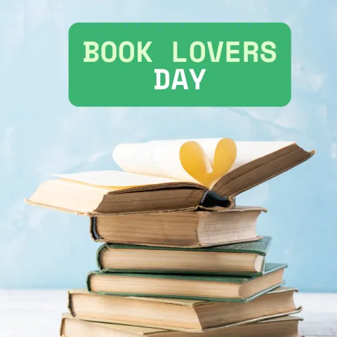stack of books with a heart on top