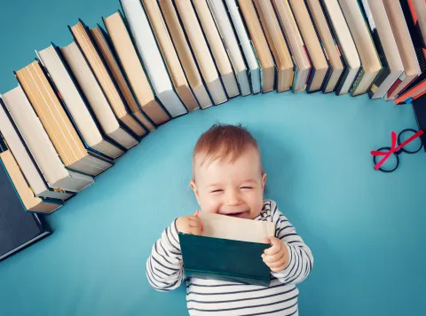 Baby reading a book
