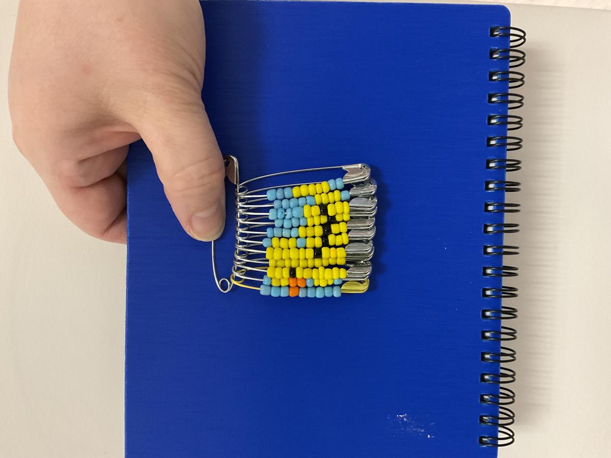 Duck made with beads on safety pins