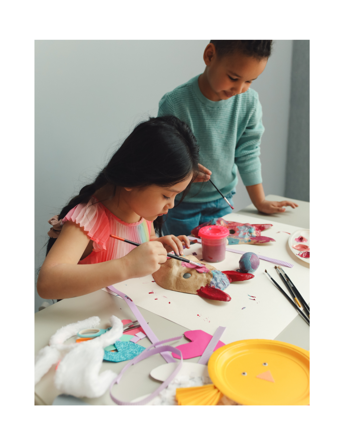 kids painting a mask