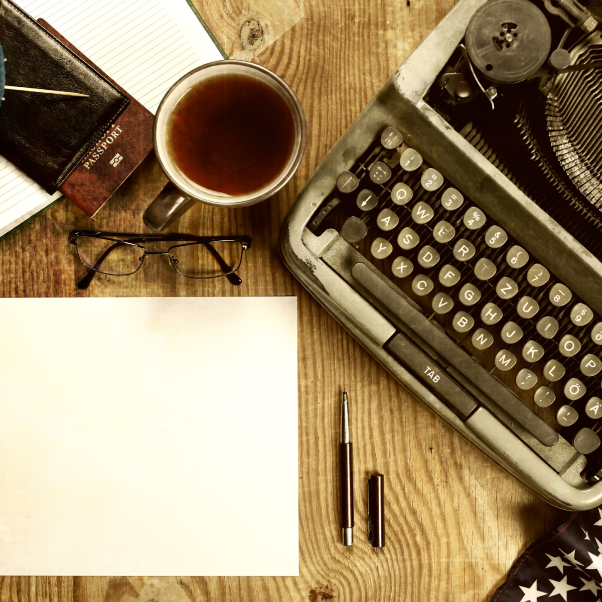 Photo of typewriter and note pad