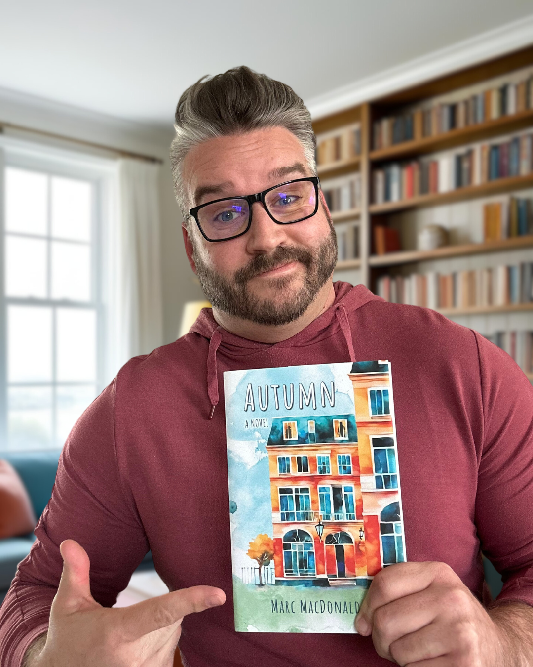 Author Marc Macdonald with his book Autumn